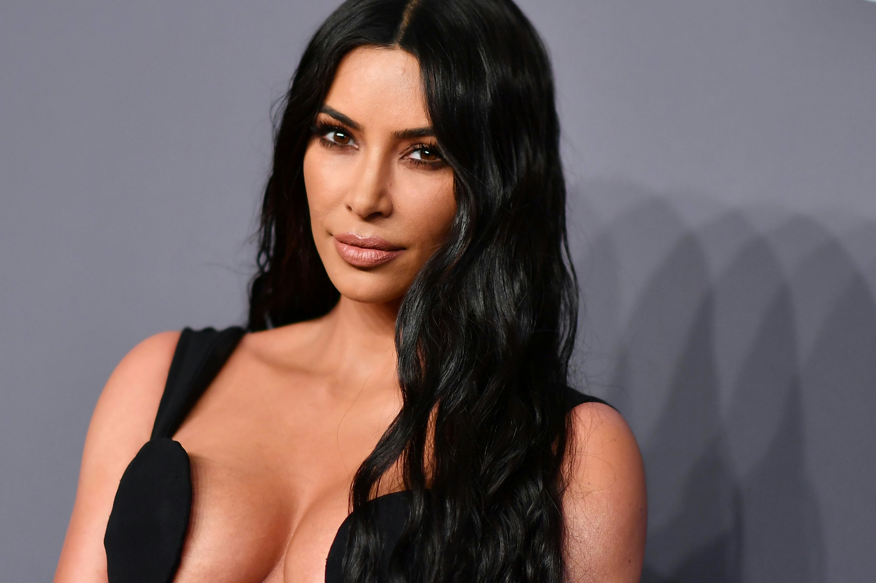 Kim Kardashian's Latest SKIMS Swim Collection Is Convincing Us to Get a  Pleather Bikini