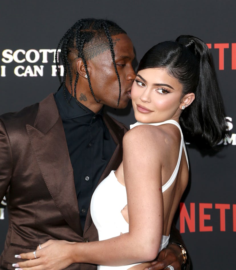 Kylie Jenner ponytail kissing Travis Scott at Netflix premiere 2019