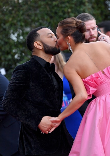 Chrissy Teigen and John Legend attend the 64th Annual GRAMMY Awards at MGM Grand Garden Arena on Apr...