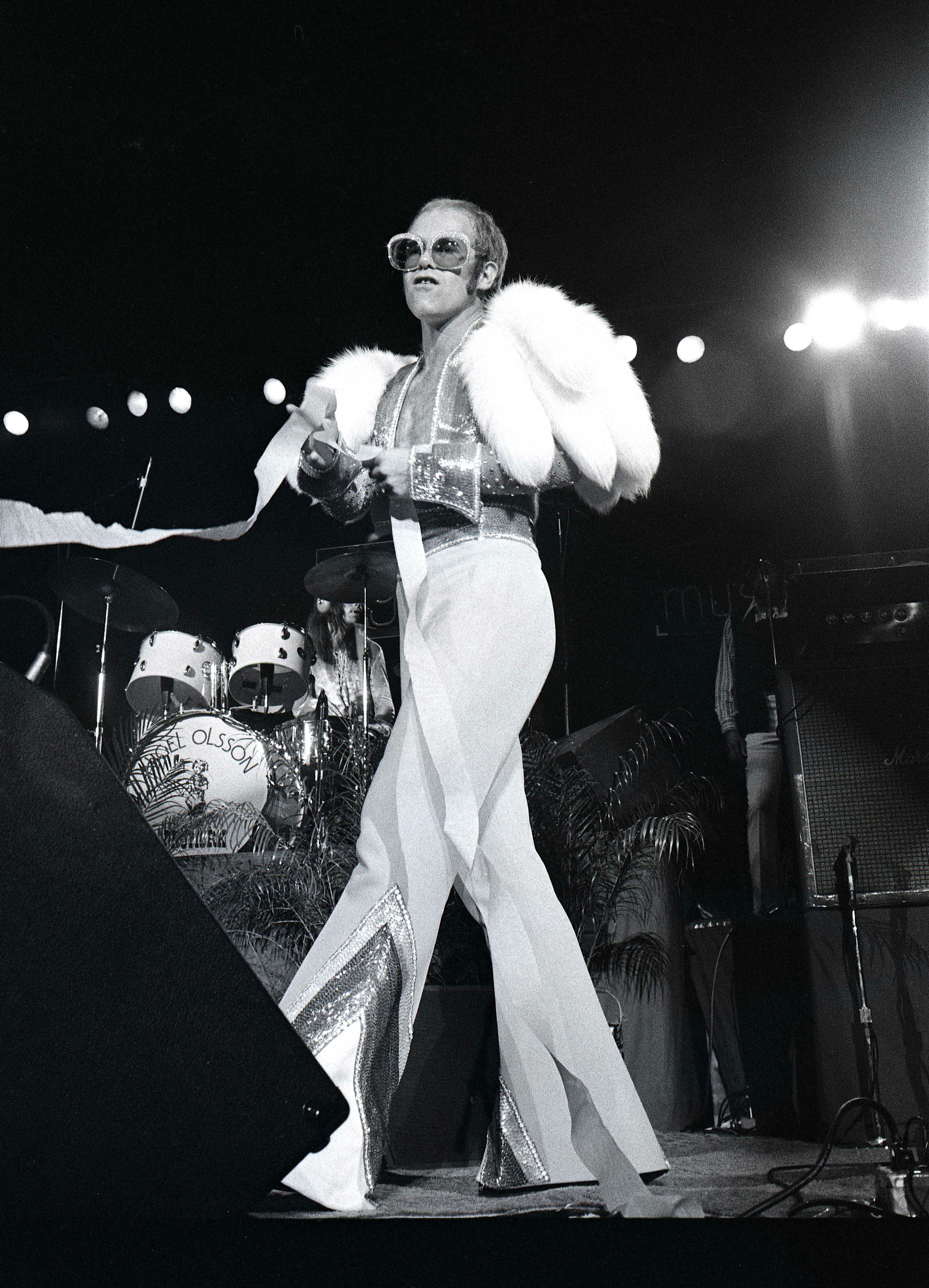 UNITED STATES - OCTOBER 01:  Photo of Elton JOHN; Elton John performing on stage, full length, fur  &hellip;