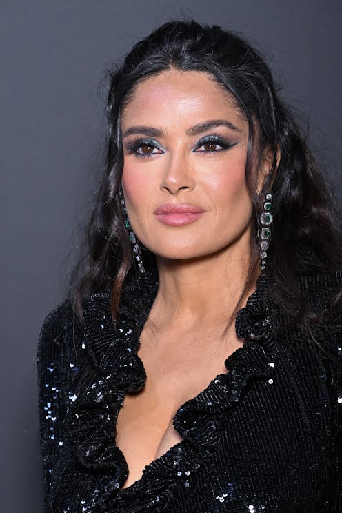 Salma Hayek long wavy hair with green eyeshadow 2023