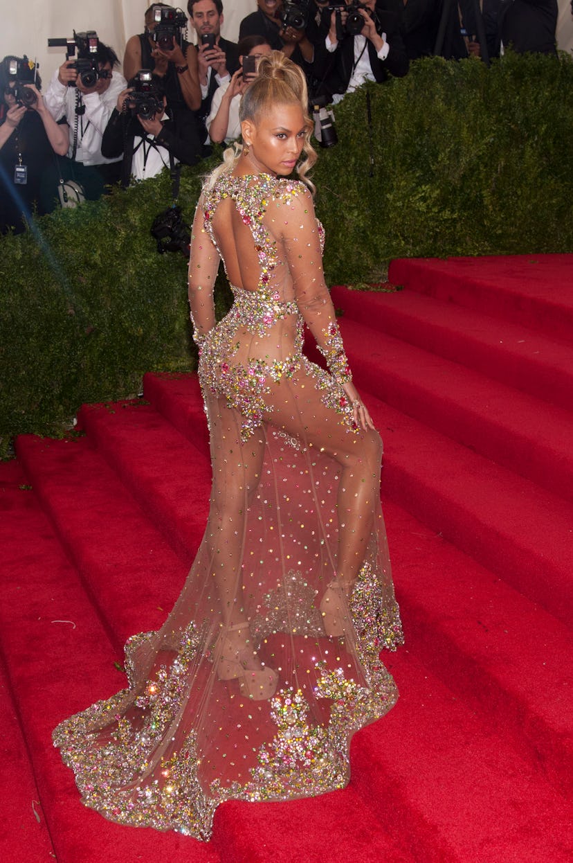 Beyonce wears a sheer, see-through dress at the 2015 Met Gala. 