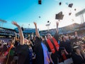 Boston, MA - May 7: Northeastern University students celebrate the conclusion of their University's ...