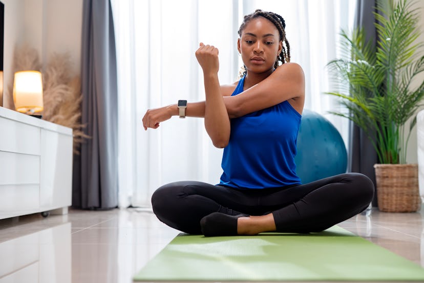 Improve, Maintain Good Posture and Emotional Intelligence With Yoga Practicing. An African American ...