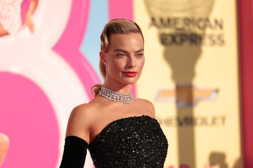 Margot Robbie's '60s hairstyle & makeup look at the premiere of the "Barbie" movie on July 9, 2023.