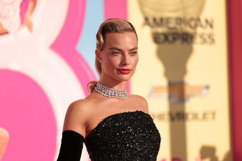Margot Robbie's '60s hairstyle & makeup look at the premiere of the "Barbie" movie on July 9, 2023.