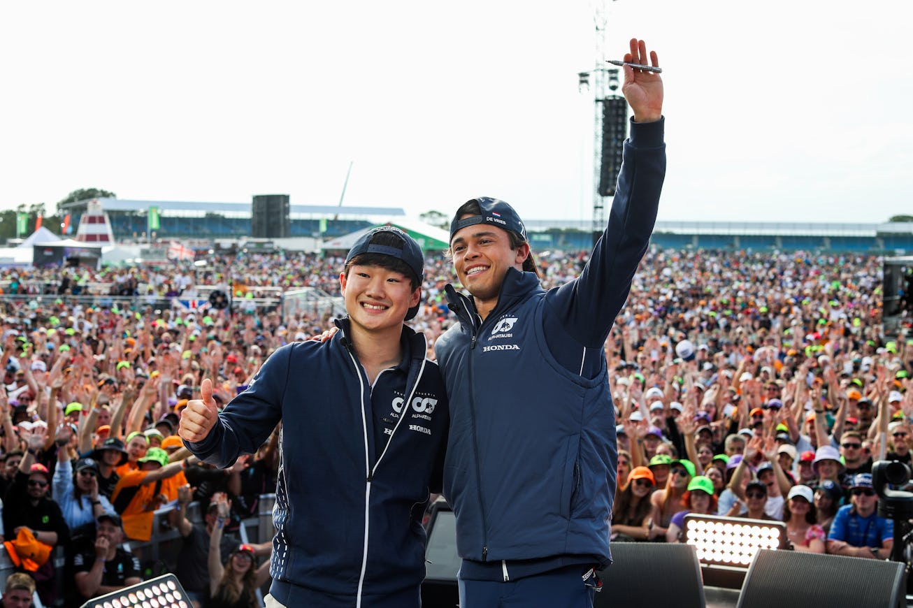 NORTHAMPTON, ENGLAND - JULY 08: Yuki Tsunoda of Scuderia AlphaTauri and Japan and Nyck de Vries of S...