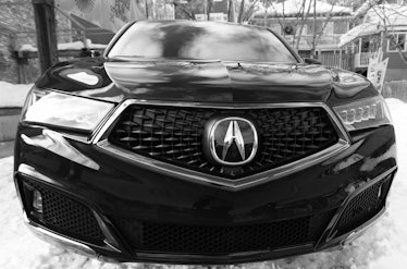 The grill of an Acura MDX.