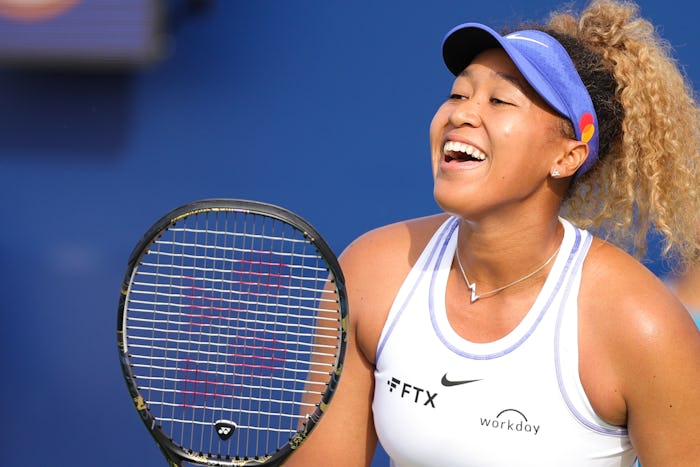 SAN JOSE, CALIFORNIA - AUGUST 02: Naomi Osaka of Japan reacts against Qinwen Zheng of China during t...