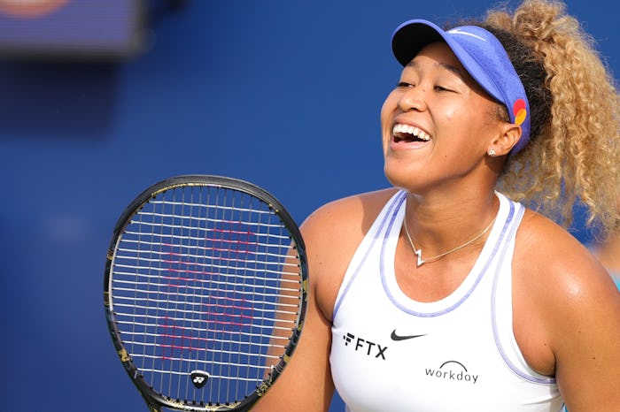 SAN JOSE, CALIFORNIA - AUGUST 02: Naomi Osaka of Japan reacts against Qinwen Zheng of China during t...