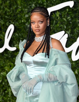 Rihanna braids and seafoam green gown at fashion awards 2022