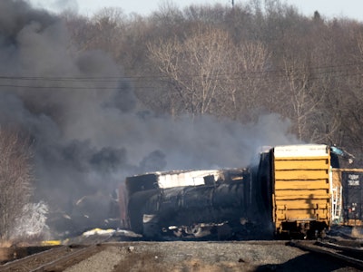 Smoke rises from a derailed cargo train in East Palestine, Ohio, on February 4, 2023. - The train ac...