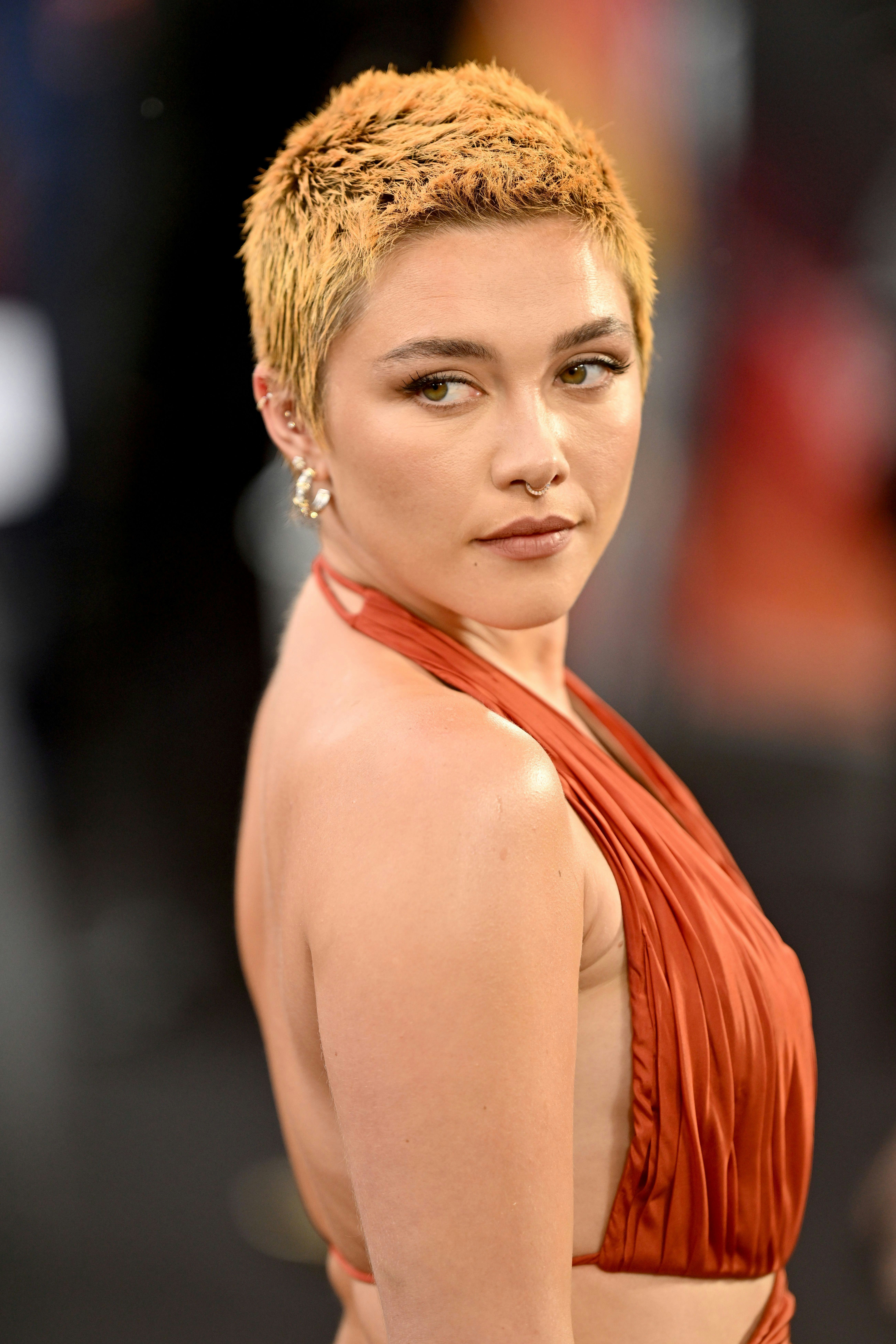 Florence Pugh&rsquo;s short orange hair at the &ldquo;Oppenheimer&rdquo; UK Premiere in July 2023.