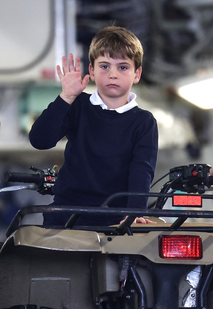FAIRFORD, ENGLAND - JULY 14: Prince Louis of Wales waves as he sits inside a vehicle on a C17 plane ...