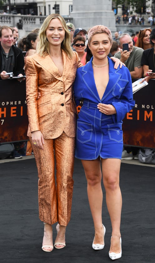 LONDON, ENGLAND - JULY 12: Emily Blunt (L) and Florence Pugh attend a photocall for "Oppenheimer" in...