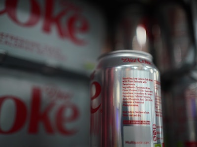 Cans of Diet Coke in a supermarket, as an artificial sweetener commonly used in thousands of product...