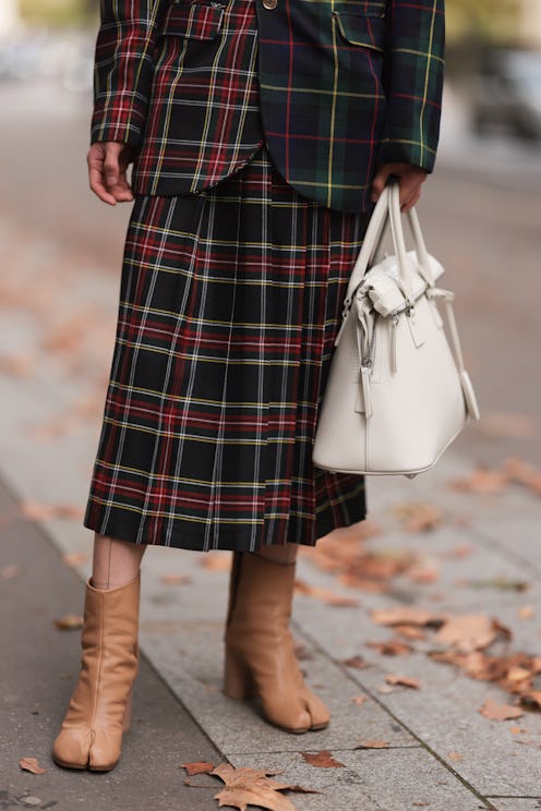 Hyeokjin Eum seen wears Maison Margiela tan tabi boots