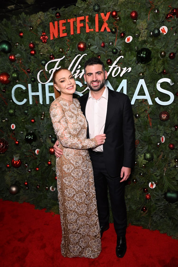 Lindsay Lohan and Bader Shammas attend Netflix’s Falling For Christmas Celebratory Holiday Fan Scree...