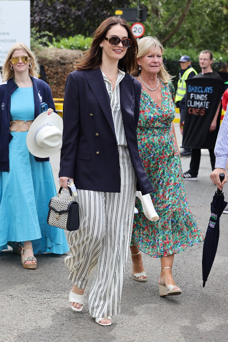 Lily James attends day fourteen of the Wimbledon Tennis Championships 