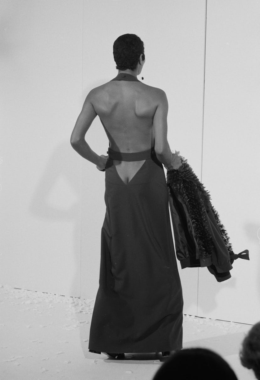 Courrèges sends a model with a butt cut-out down the 1974 runway.