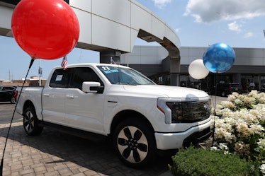 NILES, ILLINOIS - JULY 18: A 2023 Ford F-150 Lightning EV is offered for sale at Golf Mill Ford on J...