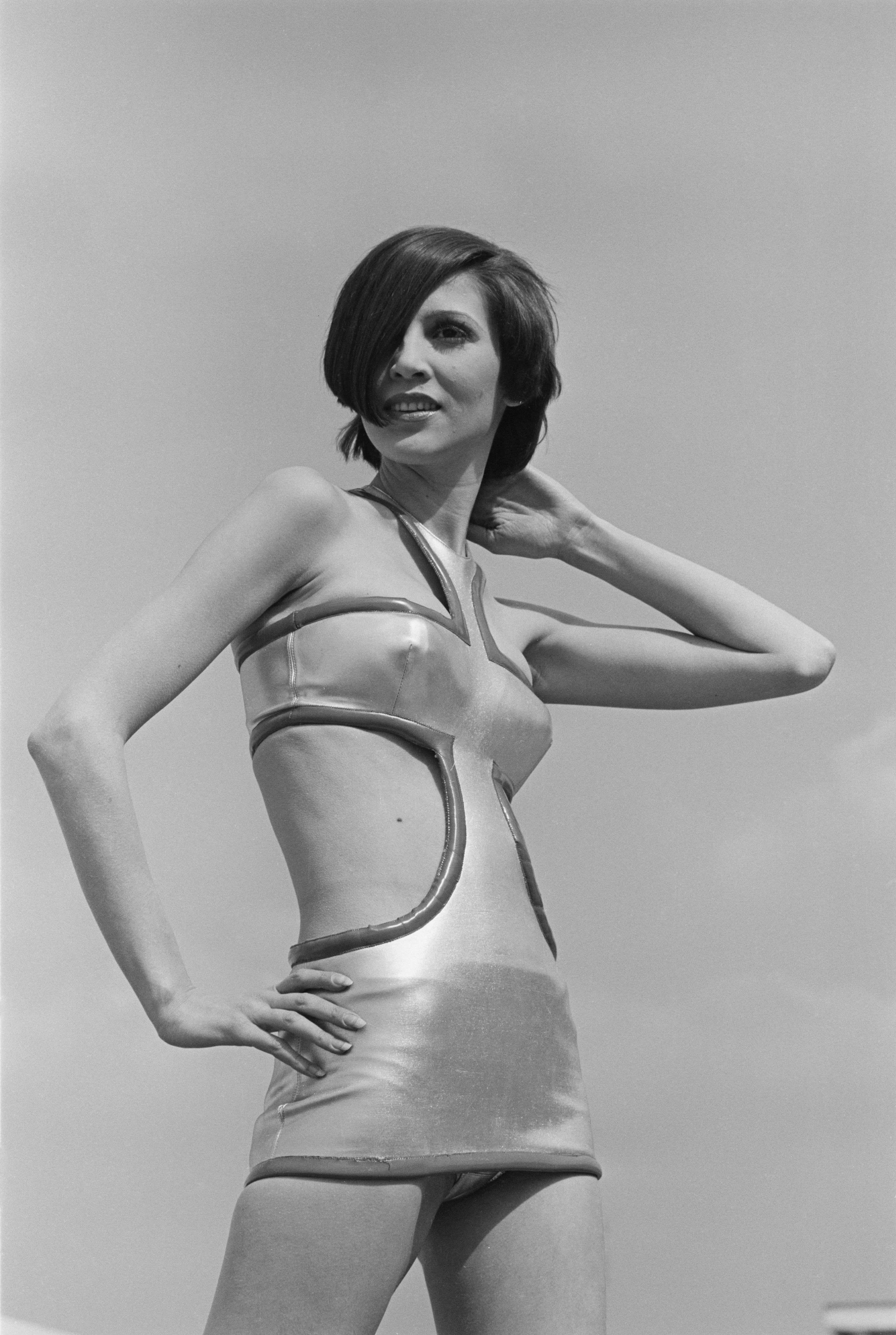 A fashion model wearing vinyl bikini by French fashion designer Pierre Cardin.