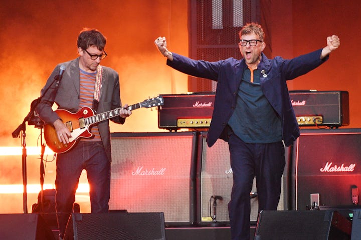 LONDON, ENGLAND - JULY 08: Damon Albarn and Graham Coxon of Blur perform at Wembley Stadium on July ...