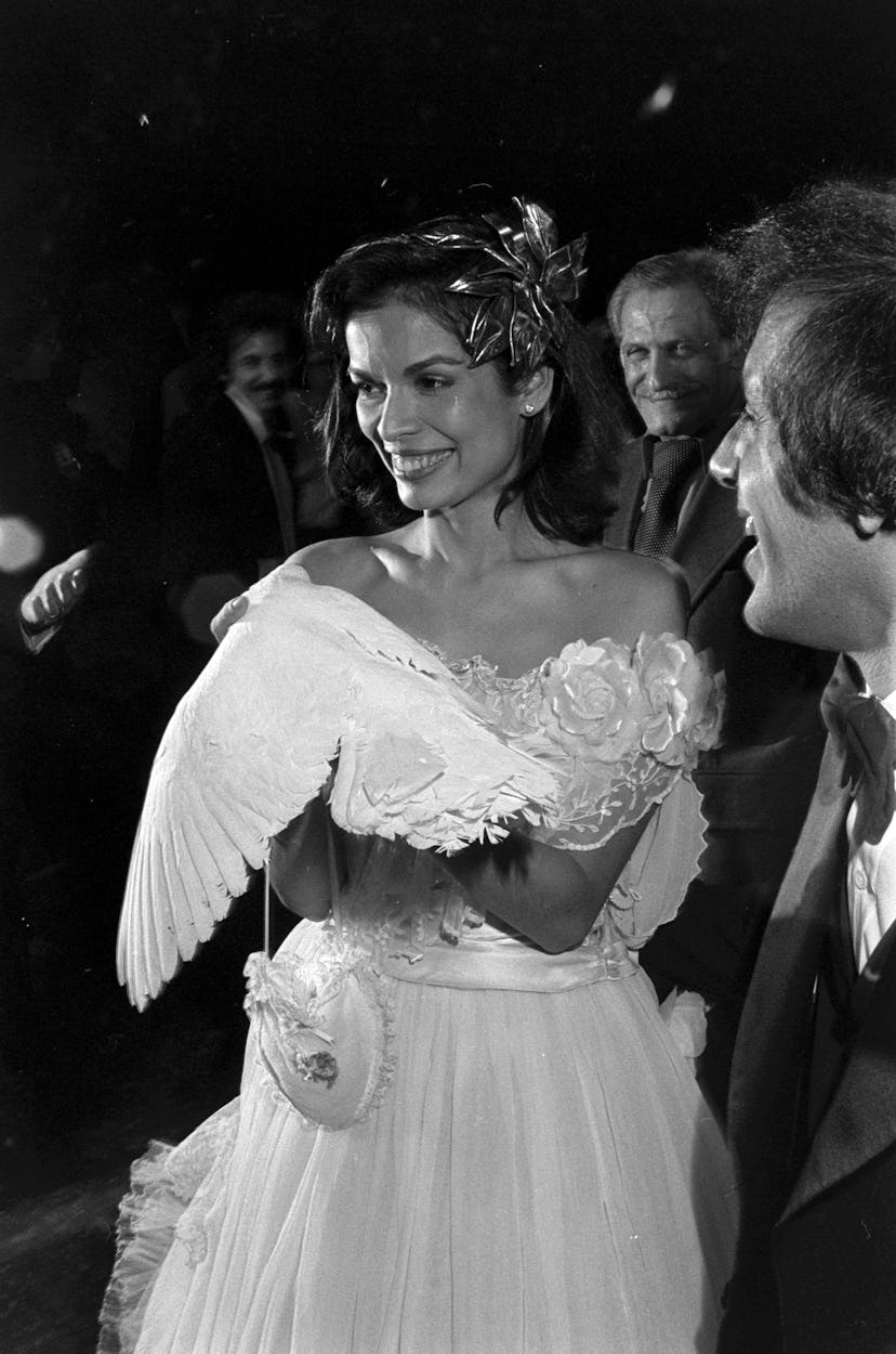 Bianca Jagger (C) and Steve Rubell (R) attend a party at Studio 54 in New York City on December 12, ...