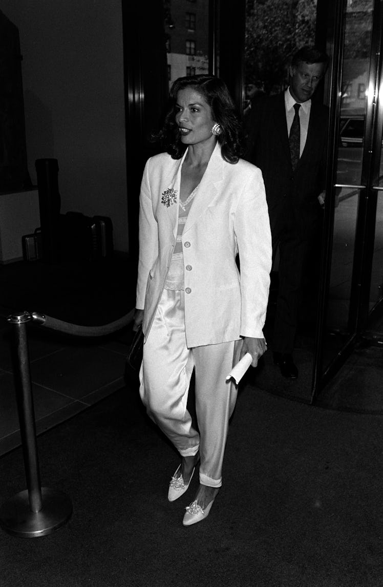 Bianca Jagger (foreground) attends an event at the Asia Society and Museum in New York City on Septe...