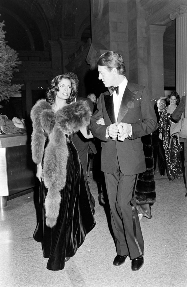 Bianca Jagger and Halston attend a party at the Metropolitan Museum of Art in New York City.