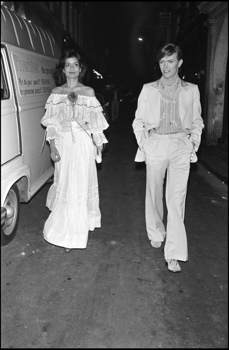 Bianca Jagger and David Bowie leaving a party in Paris. 