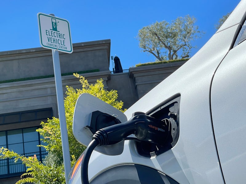 CORTE MADERA, CALIFORNIA - JUNE 27: An electric car charges at a mall parking lot on June 27, 2022 i...