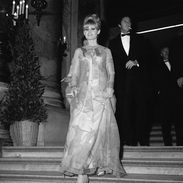 (Original Caption) Dressed in evening-gown actress Brigitte Bardot 