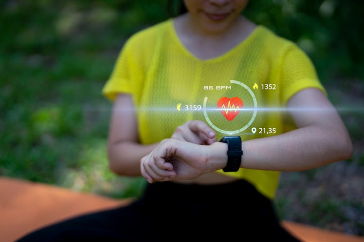 smartwatch with heart rate check app on the screen, gadget for fitness active lifestyle.