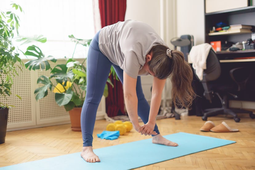 A forward fold helps align your root chakra.