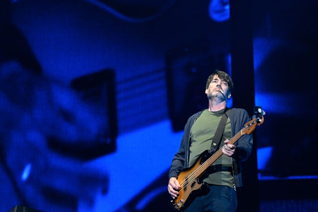 British band Blur bass player Alex James performs during the music festival Les Vieilles Charrues in...