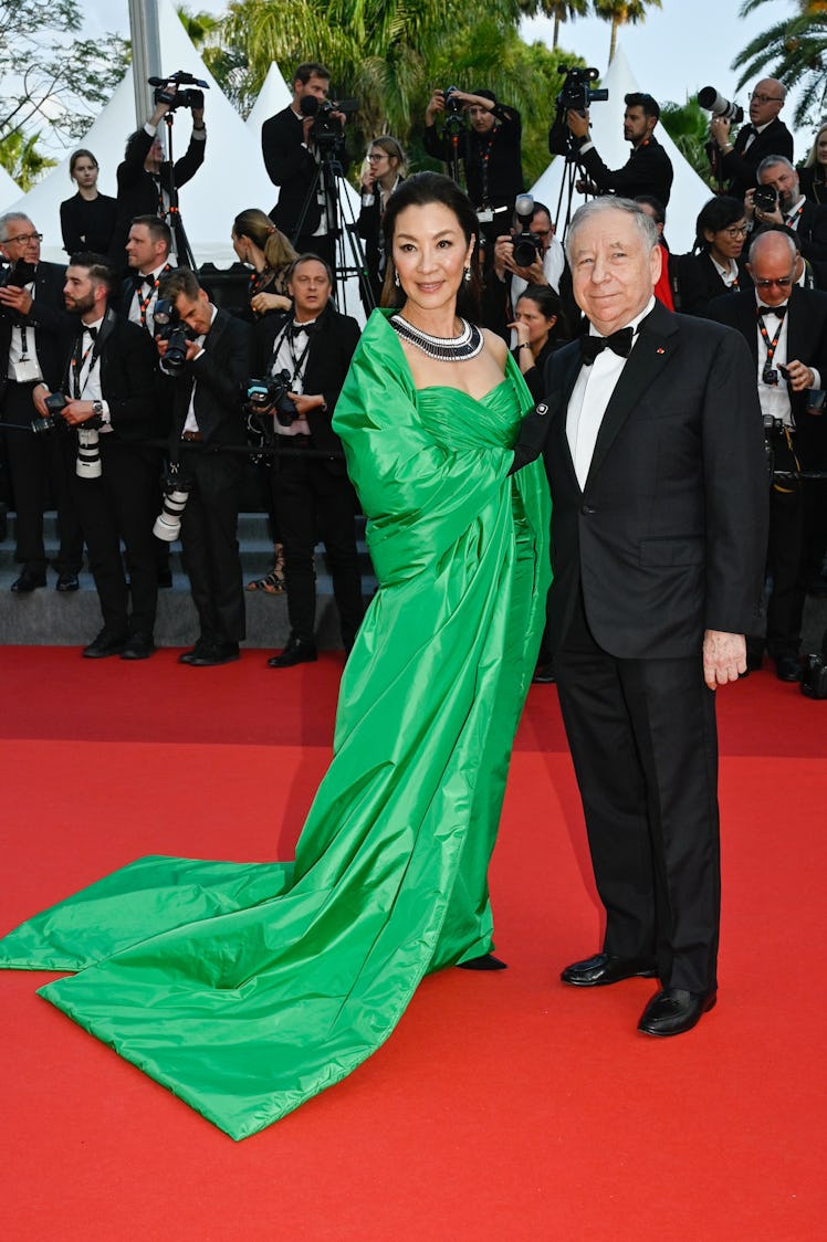 Michelle Yeoh and Jean Todt attend the "Firebrand (Le Jeu De La Reine)" red carpet during the 76th a...