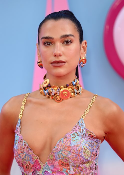 Dua Lipa wears a sparkly spaghetti strap dress at the "Barbie" European Premiere.