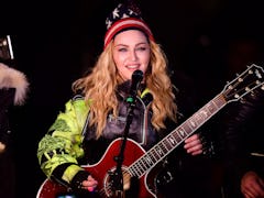 NEW YORK, NY - NOVEMBER 07:  Madonna perfroms a surprise concert at Washington Square Park in suppor...