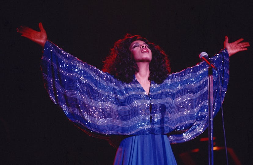 CIRCA 1978: 'Queen of Disco' Donna Summer performs onstage in a shimmering blue dress in circa 1979....
