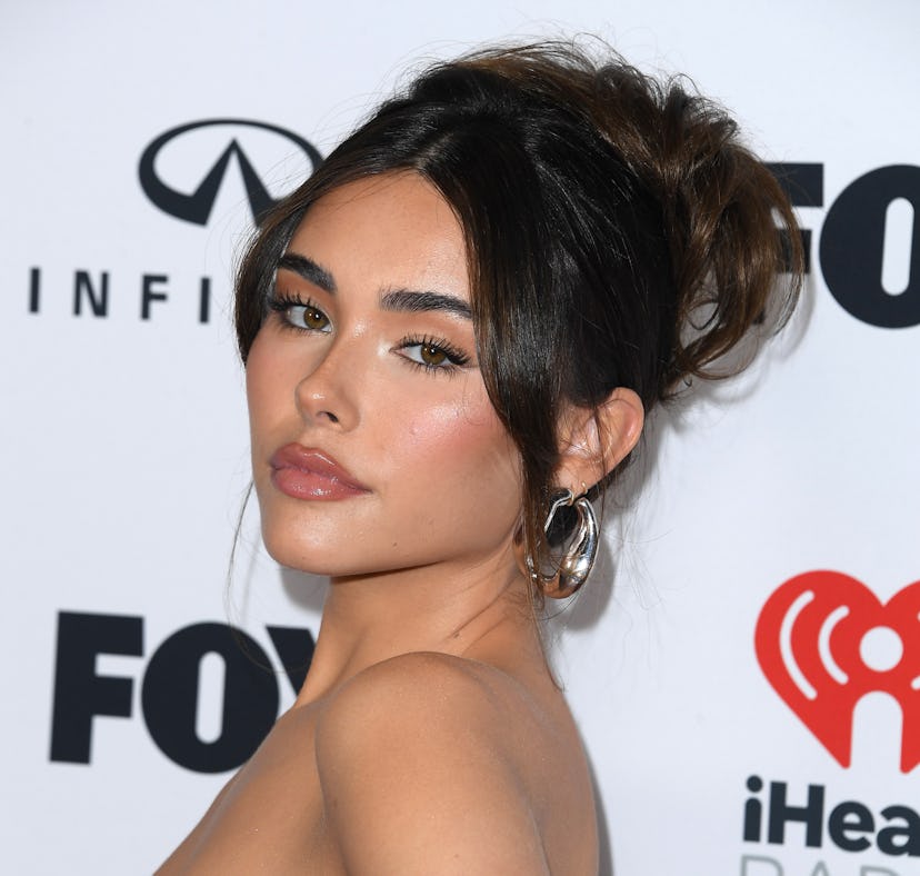 Madison Beer responded to the success of Olivia Rodrigo's "vampire," hinting it may be about Zack Bi...