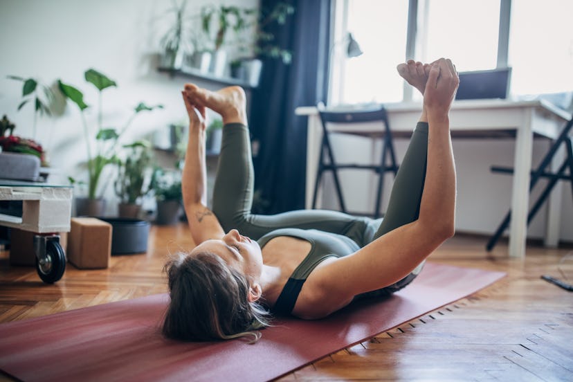 Happy baby helps release tight hips.