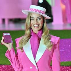 Margot Robbie Barbie movie hat and cell phone at Korean premiere