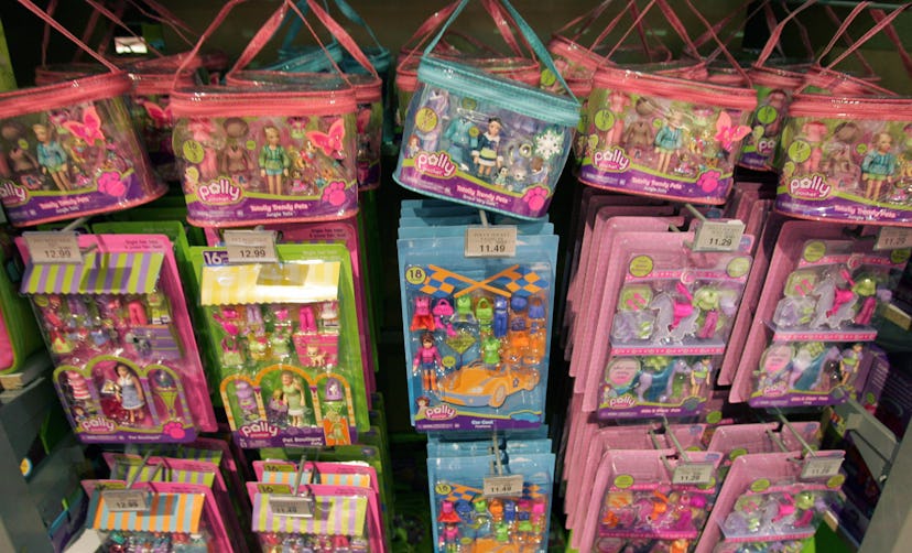 Polly Pocket toys hang on display in a Manhattan toy store 14 August, 2007 in New York.  Mattel on T...