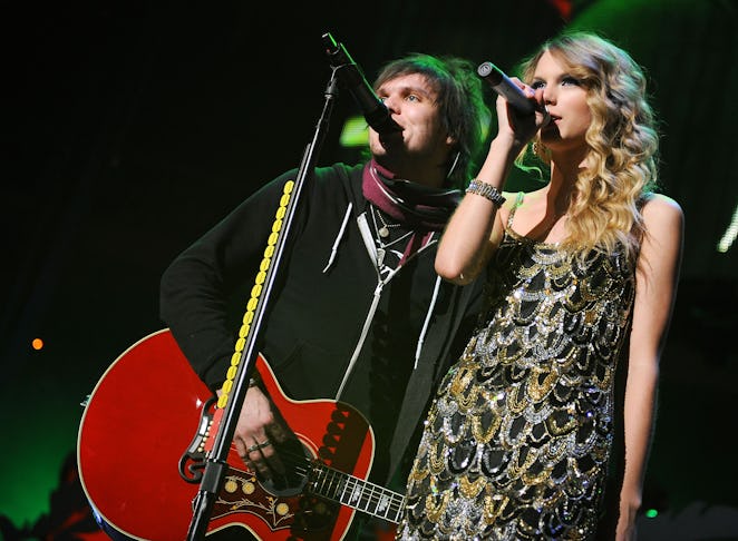 NEW YORK - DECEMBER 11:  Martin Johnson of Boys Like Girls performs onstage with Taylor Swift during...