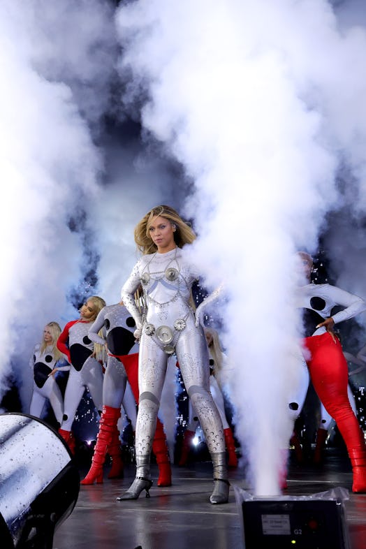 Beyoncé wears an all-silver outfit with a nipple cover bodychain during the Chicago leg of her Renai…