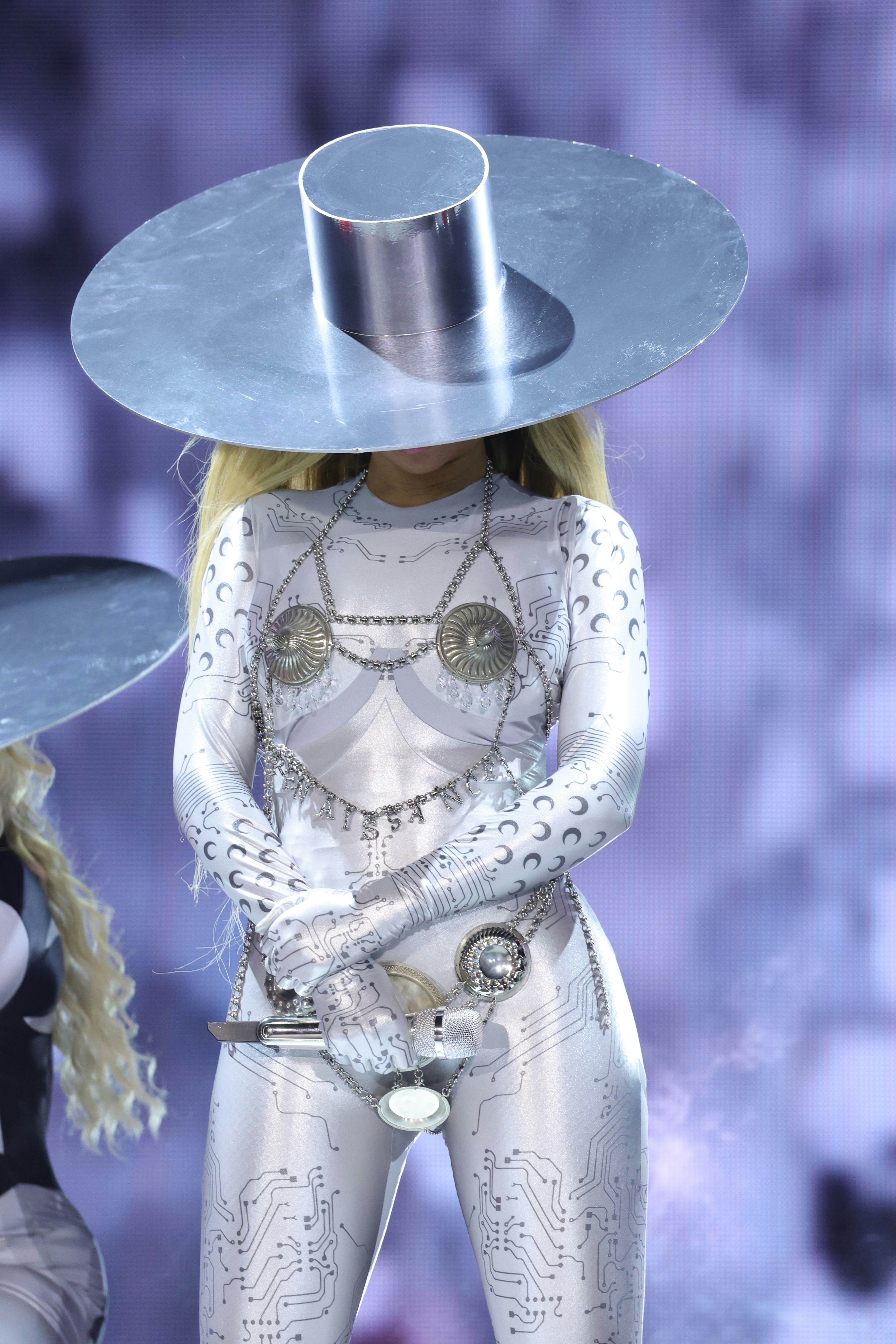 Beyoncé wears an all-silver outfit with a nipple cover bodychain during the Chicago leg of her Renai&hellip;