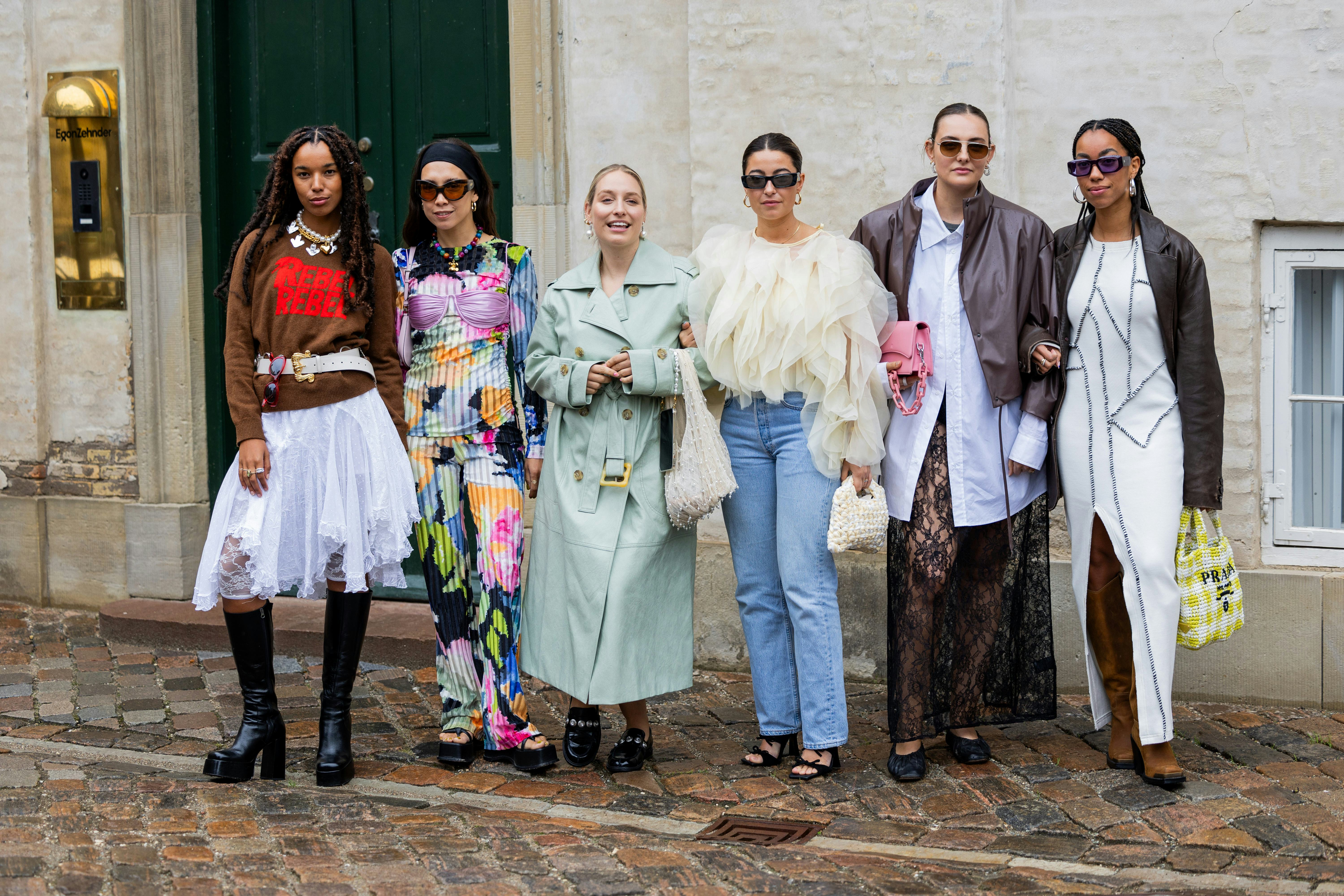 COPENHAGEN, DENMARK - AUGUST 09: Group of guests outside Marimekko during the Copenhagen Fashion Wee...