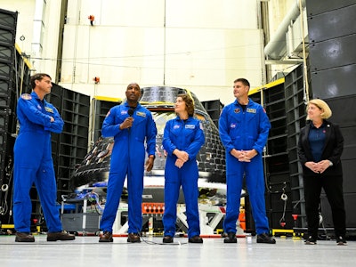 The crew of Artemis II, US astronauts Victor Glover (R), pilot; Reid Wiseman (2nd L), commander; Chr...