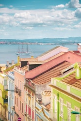 Idyllic view of the Alfama district in Lisbon with colorful classic houses with ceramics in beautifu...